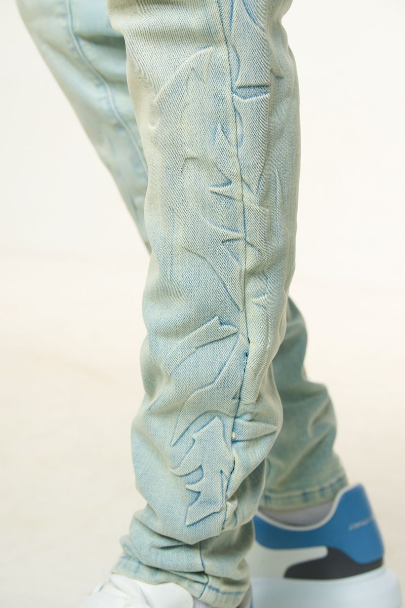 "LOVE IS PAIN" EMBOSSED SKINNY DENIM (LIGHT BLUE/SAND)