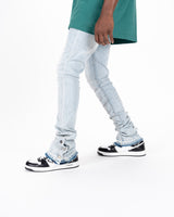 "EMOTIONALLY DRIVEN" FLARE STACK DENIM