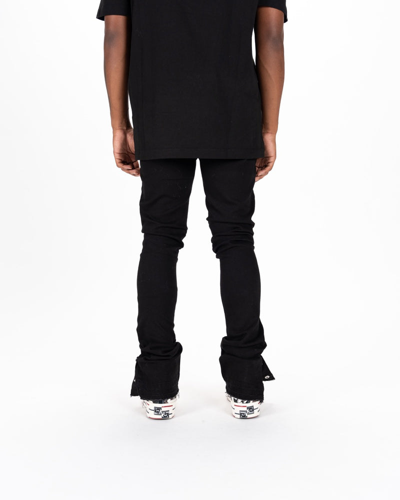 "EMOTIONALLY DRIVEN" FLARE STACK DENIM