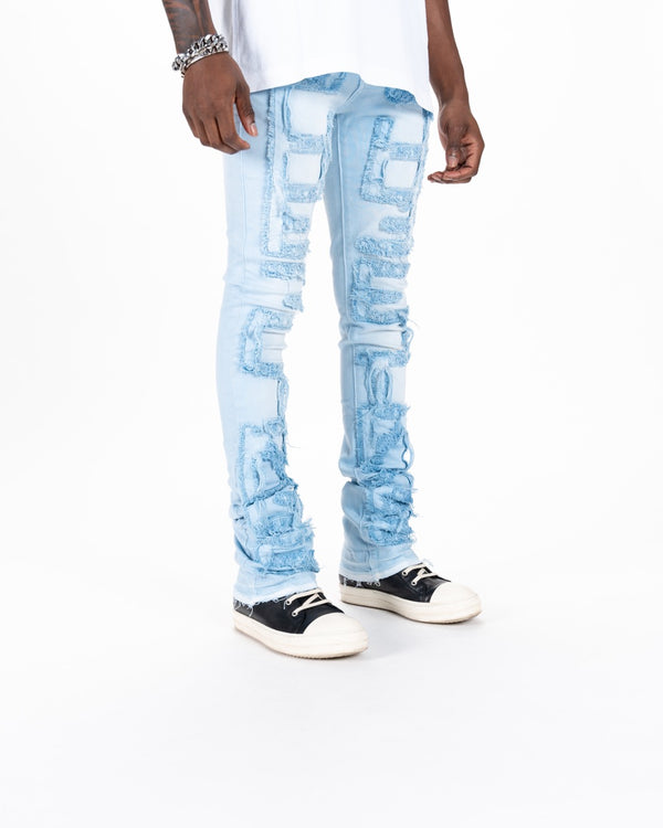 "INSPIRED BY" FLARE STACK DENIM